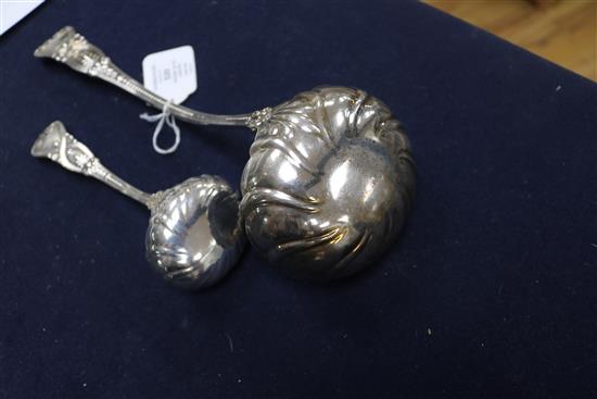 A Tiffany & Co sterling silver soup ladle and matching sauce ladle, 11 oz.